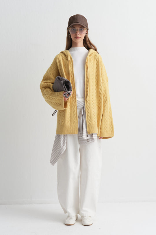 Knit vest met capuchon
